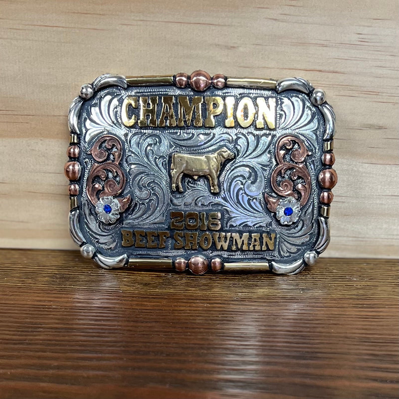 https://christiproctorhurst.com/cdn/shop/products/2016.champion.beef.showman.trophy.buckle_800x.jpg?v=1664049137